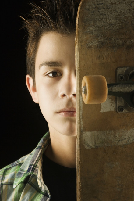 A Boy With A Skateboard PosterPrint