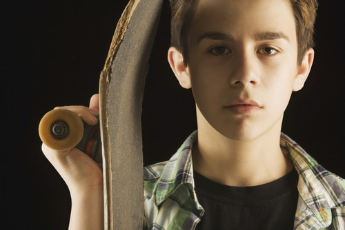 A Boy With A Skateboard PosterPrint