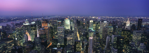 Aerial View Of Midtown Manhattan Illuminated At Dusk PosterPrint - Item # VARDPI1891941