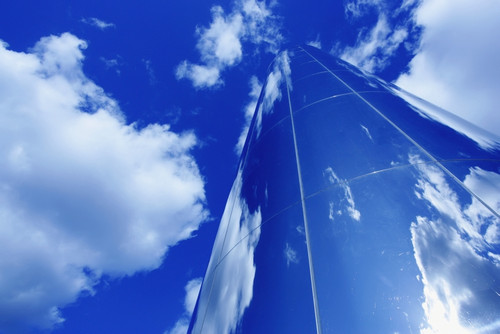 Glass Obelisk With Blue Sky And Cloud Reflections PosterPrint - Item # VARDPI1884636