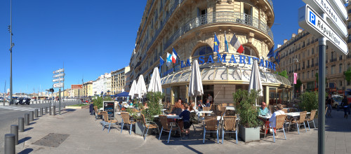 People at sidewalk cafe, Marseille, Bouches-Du-Rhone, Provence-Alpes-Cote D'Azur, France Poster Print by Panoramic Images - Item # VARPPI155524