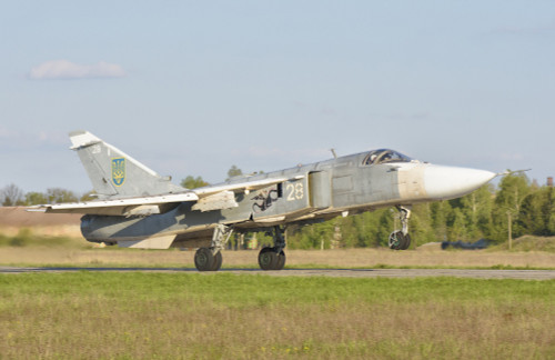 Ukrainian Air Force Su-24 aircraft landing at Lutsk Air Base, Ukraine. Poster Print by Giovanni Colla/Stocktrek Images - Item # VARPSTGCA100723M