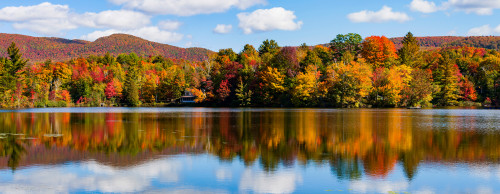 Reflection of autumn trees on water, Sally's Pond, West Bolton, Quebec, Canada Poster Print by Panoramic Images - Item # VARPPI173900