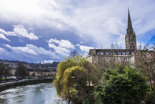 Saint John's church along side the River Avon under dramatic skies; Bath, Somerset, England Poster Print by Leah Bignell / Design Pics - Item # VARDPI12309620