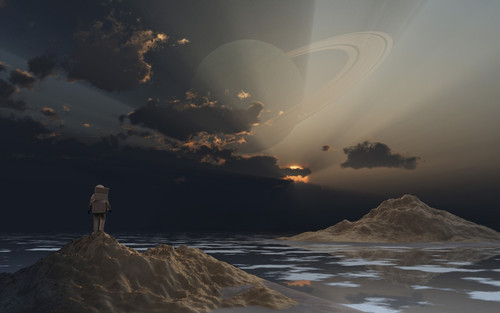 An astronaut exploring an alien moon that orbits a ringed planet. Poster Print by Mark Stevenson/Stocktrek Images - Item # VARPSTMAS200083S
