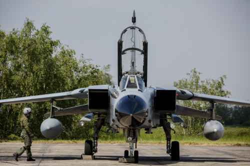German Air Force pilot walking to his Tornado aircraft. Poster Print by Timm Ziegenthaler/Stocktrek Images - Item # VARPSTTZG100583M