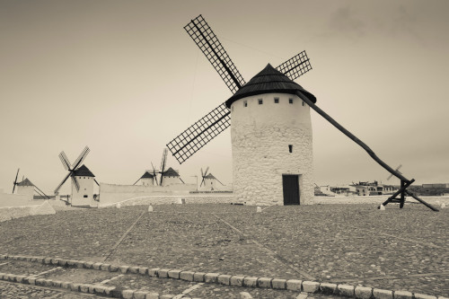 Antique windmills in a field, Campo De Criptana, Ciudad Real Province, Castilla La Mancha, Spain Poster Print by Panoramic Images - Item # VARPPI156910