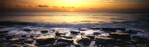 View of sea at sunset, South Wales, England Poster Print by Panoramic Images - Item # VARPPI161447