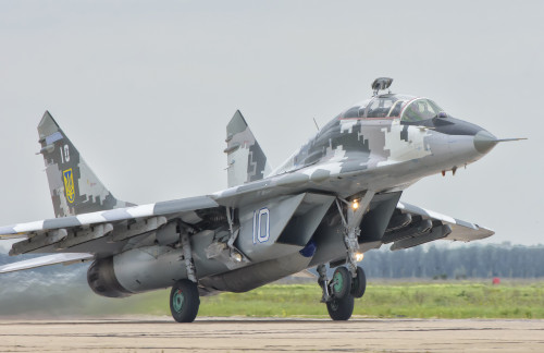 Ukrainian Air Force MiG-29 taking off for a training mission. Poster Print by Giovanni Colla/Stocktrek Images - Item # VARPSTGCA100711M
