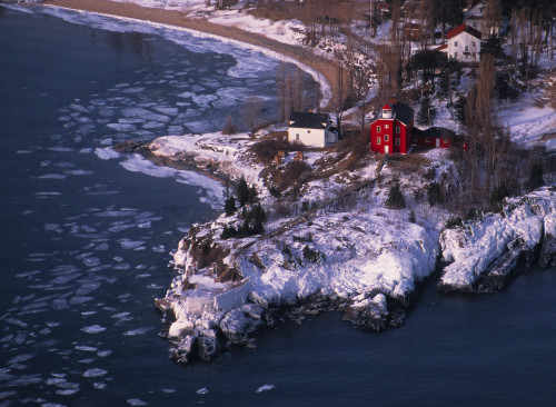Marquette Harbor Lighthouse and Maritime Museum in winter, Marquette, Michigan, USA Poster Print by Panoramic Images - Item # VARPPI173652