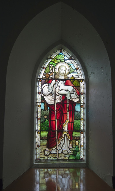 A Stained Glass Window Depicting Jesus Holding A Sheep At Church On The Beach; Ardnamurchan, Argyl, Scotland Poster Print by John Short / Design Pics - Item # VARDPI1971289