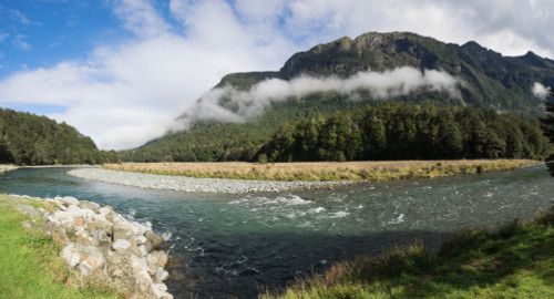 River with mountain range in the background, Eglinton River, Eglinton Mountains, MacKay Creek, Te Anau-Milford Road, State Highway 94, Southland, South Island, New Zealand Poster Print by Panoramic Images - Item # VARPPI171491