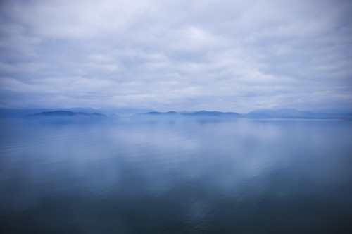 Beautiful moody sky reflected in the calm waters of Ballinskelligs Bay; County Kerry, Ireland Poster Print by Leah Bignell / Design Pics - Item # VARDPI12306518