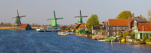 Windmills along the Zaan River at Zaanse Schans, Zaandam, North Holland, Netherlands Poster Print by Panoramic Images - Item # VARPPI158175