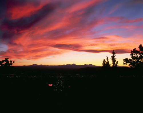 Sunset over the Cascade Range and city of Bend, Deschutes County, Oregon, USA Poster Print by Panoramic Images - Item # VARPPI173793