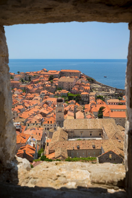 Dubrovnik, Dubrovnik-Neretva County, Croatia. View over rooftops of the old town from the Minceta Tower. Boats in the Old Port. Cruise boats under way. Poster Print by Panoramic Images - Item # VARPPI170126