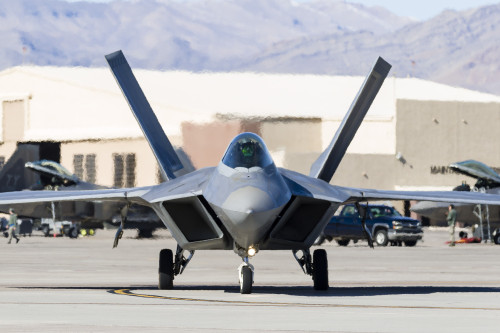 A U.S. Air Force F-22A Raptor taxiing at Nellis Air Force Base, Nevada. Poster Print by Rob Edgcumbe/Stocktrek Images - Item # VARPSTRDG100200M