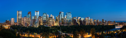 Skylines in a city, Bow River, Calgary, Alberta, Canada Poster Print by Panoramic Images - Item # VARPPI174054