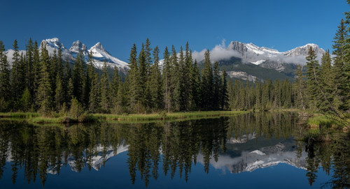 Lake with mountains in background, Three Sisters Mountain, Mount Lawrence Grassi, Canmore, Alberta, Canada Poster Print by Panoramic Images - Item # VARPPI174156