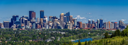 Skylines in a city, Bow River, Calgary, Alberta, Canada Poster Print by Panoramic Images - Item # VARPPI174060