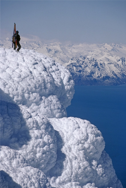 Mountaineer Standing On Ridge Viewing Vast Scenery From Augustine Volcano Across Cook Inlet Alaska Poster Print by Chris Flowers / Design Pics - Item # VARDPI2096494