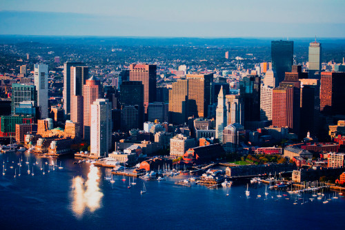AERIAL morning view of Boston Skyline and Financial Districtas sunlight reflects off windows, Boston, MA Poster Print by Panoramic Images - Item # VARPPI181971