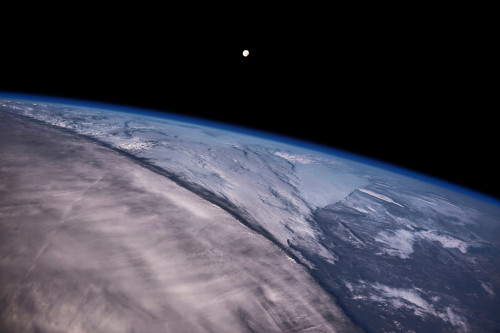 Satellite view of Earth with moon glowing over Saskatchewan, Canada Poster Print by Panoramic Images - Item # VARPPI181296