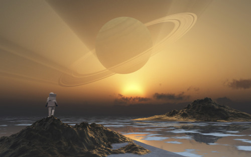 An astronaut exploring an alien moon that orbits a ringed planet. Poster Print by Mark Stevenson/Stocktrek Images - Item # VARPSTMAS200079S