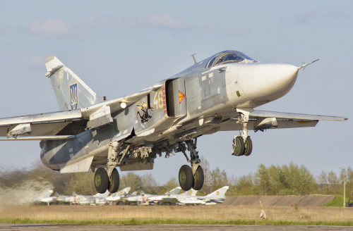 Ukrainian Air Force Su-24 aircraft landing at Lutsk Air Base, Ukraine. Poster Print by Giovanni Colla/Stocktrek Images - Item # VARPSTGCA100725M