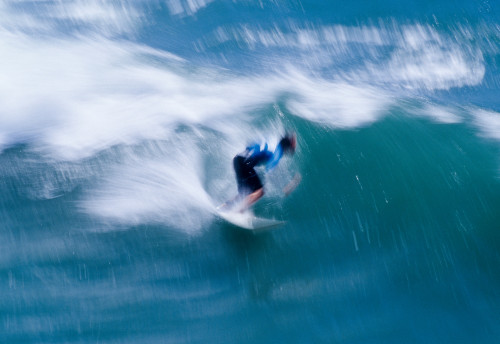 Surfer in motion Poster Print by Panoramic Images - Item # VARPPI173743