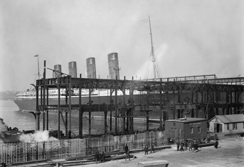 New York: Lusitania, 1908. /Nthe Cunard Steamship 'Lusitania' Docking At The Hudson River Piers With Construction Of New Piers In Foreground, 20 November 1908. Poster Print by Granger Collection - Item # VARGRC0110566