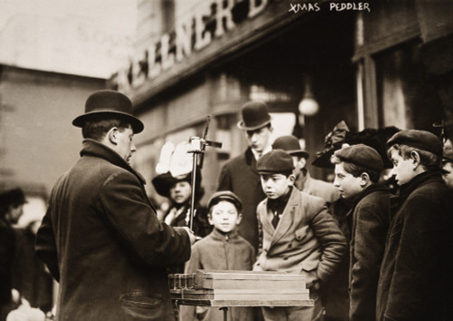 Nyc Street Peddler, 1910. /Na New York City Street Peddler Demonstrating Whirligigs, December 1910. Poster Print by Granger Collection - Item # VARGRC0007373 Nyc Street Peddler, 1910. /Na New York City Street Peddler Demonstrating Whirligigs, December 1910. Poster Print by Granger Collection - Item # VARGRC0007373