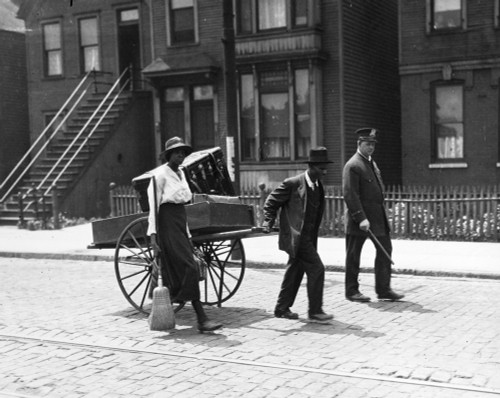 Chicago: Race Riot, 1919. /Na Police Officer Leading An African American Couple To Safety During The Chicago Race Riot Of 1919. Photograph. Poster Print by Granger Collection - Item # VARGRC0260047