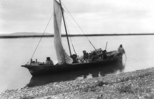 Alaska: Eskimo Sailboat. /Nthree Eskimo Men And Their Dogs In A Sailboat Starting Up The Noatak River At The Town Of Kotzebue, Alaska. Photographed By Edward S. Curtis, C1929. Poster Print by Granger Collection - Item # VARGRC0121595