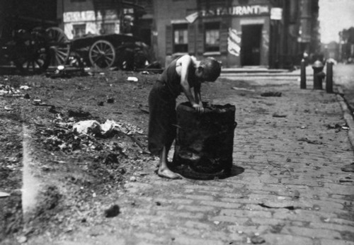 New York: Poverty, 1915. /Nbarefoot Boy Picking Trash On The Westside Of New York. Photograph By Lewis Hine, 1915. Poster Print by Granger Collection - Item # VARGRC0125156