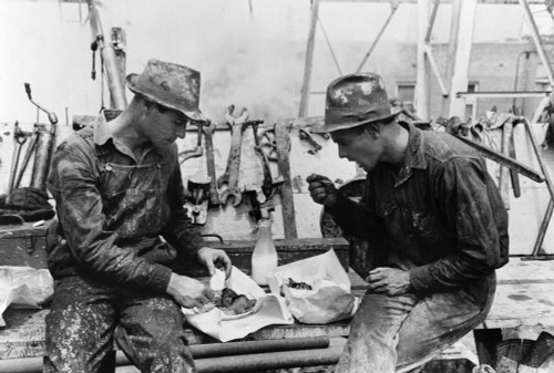 Oil Workers, 1939. /Noil Field Workers Eating Lunch, Kilgore, Texas. Photograph By Russell Lee, April 1939. Poster Print by Granger Collection - Item # VARGRC0121621