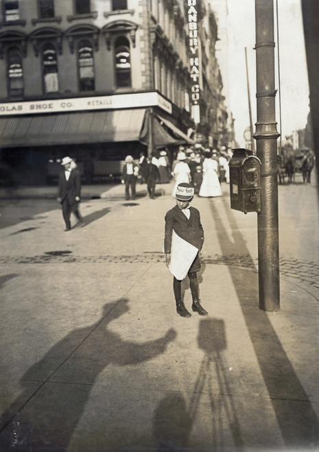Newsboy, 1908. /Nnewsboy On A Street Corner In Indianapolis, Indiana. Photograph By Lewis Hine, 1908. Hine'S Shadow Is Visible In The Foreground. Poster Print by Granger Collection - Item # VARGRC0123340