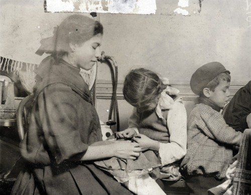 Hine: Child Labor, 1910. /Nyoung Garment Workers Sewing Piecework In A Tenement Apartment In New York City. Photograph By Lewis Hine, 1910. Poster Print by Granger Collection - Item # VARGRC0117894