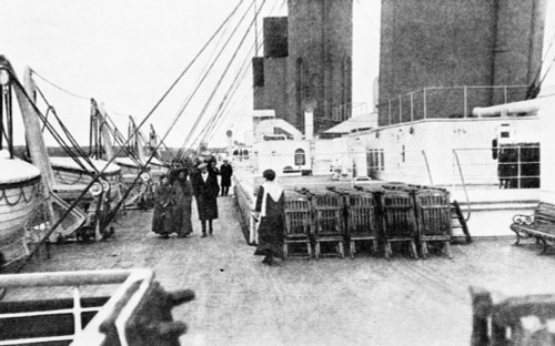 Titanic: On Deck, 1912. /Non Deck In Cork Harbour; Passing Life Boats In Which Survivors Of The Shipwreck Subsequently Escaped. Poster Print by Granger Collection - Item # VARGRC0005874