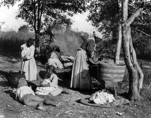 Family Wash Day, C1900./Nafrican-American Woman Doing Laundry With A Washboard And Tub, As A Girl Stirs Pot With 3 Other Children On The Ground Watching, C1900. Poster Print by Granger Collection - Item # VARGRC0113238 Family Wash Day, C1900./Nafrican-American Woman Doing Laundry With A Washboard And Tub, As A Girl Stirs Pot With 3 Other Children On The Ground Watching, C1900. Poster Print by Granger Collection - Item # VARGRC0113238