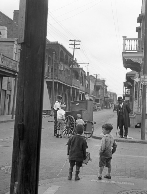 New Orleans, C1925. /Nchildren Watching An Organ Grinder On The Street Corner In New Orleans, Louisiana. Photograph By Arnold Genthe, C1925. Poster Print by Granger Collection - Item # VARGRC0527357