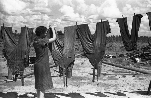 Georgia: Laundry, 1938. /Na Famer'S Wife Hanging Her Husband'S Work Clothes On A Clothesline, Irwinville Farms, Georgia. Photograph By John Vachon In May 1938. Poster Print by Granger Collection - Item # VARGRC0119166