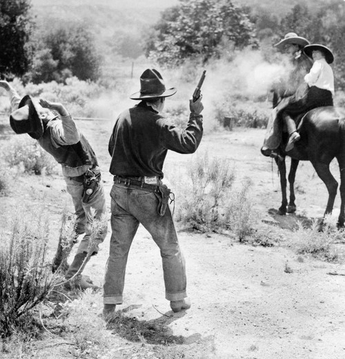 Film: Highwayman, C1926. /Nwestern Film Still Of A Shootout Between Actor Jack Hoxie With Actress Helen Holmes On Horseback, And Two Men On Foot. Stereograph, C1926. Poster Print by Granger Collection - Item # VARGRC0125541