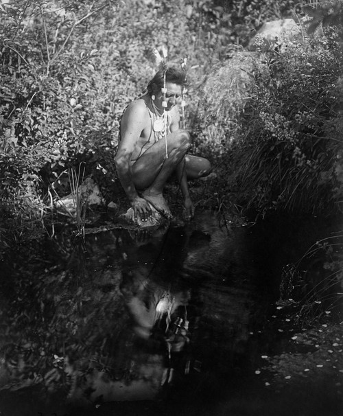 Curtis: Crow Man, C1905. /Na Crow Native American Man In Montana Gazing At His Reflection In A Pond. Photograph By Edward Curtis, C1905. Poster Print by Granger Collection - Item # VARGRC0170273