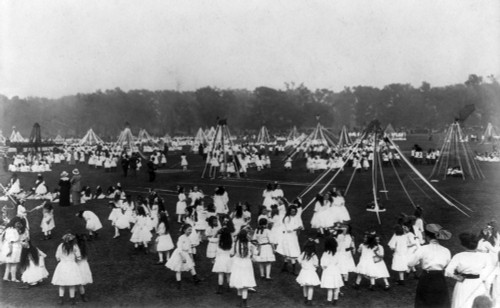 May Day, C1910. /Na Group Of Schoolgirls Dancing In A Field On May Day, Some Holding Maypoles In Central Park, New York City. Photograph, C1910. Poster Print by Granger Collection - Item # VARGRC0130998