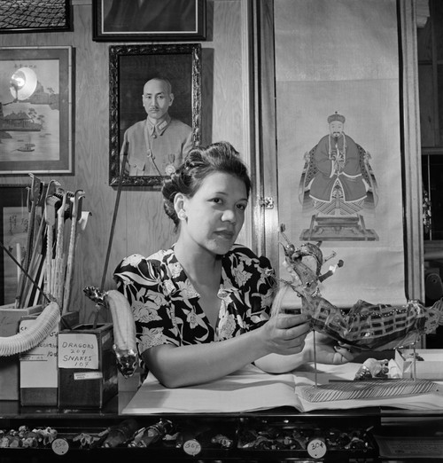 New York: Chinatown, 1942. /Nlily Chu, Owner Of A Gift Shop In Chinatown, New York City, Mending A Paper Dragon By Hand. Photograph By Marjory Collins, 1942. Poster Print by Granger Collection - Item # VARGRC0323824 New York: Chinatown, 1942. /Nlily Chu, Owner Of A Gift Shop In Chinatown, New York City, Mending A Paper Dragon By Hand. Photograph By Marjory Collins, 1942. Poster Print by Granger Collection - Item # VARGRC0323824
