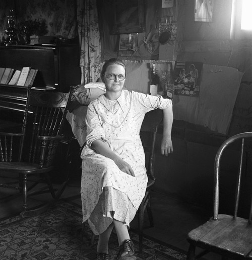 Dugout Interior, 1939. /Na Farm Wife Seated In A One-Room Basement Dugout In Dead Ox Flat, Malheur County, Oregon. Photograph By Dorothea Lange, October 1939. Poster Print by Granger Collection - Item # VARGRC0123521