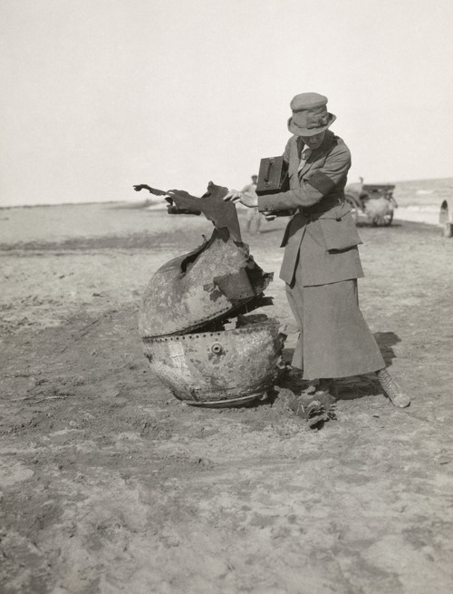 Photojournalist, 1919. /Nphotojournalist Helen Jones Kirtland Looking At A Spent Landmine, Probably Near Ypres, Belgium. Photograph, 1919. Poster Print by Granger Collection - Item # VARGRC0354443
