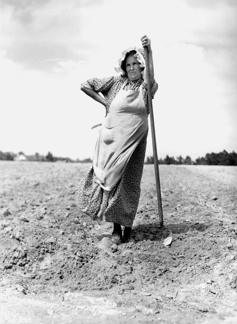 Migrant Worker, 1940. /Na Migrant Workering For A Neighbor Planting Tobacco At Durham, North Carolina. Photograph, 1940, By Jack Delano. Poster Print by Granger Collection - Item # VARGRC0000749
