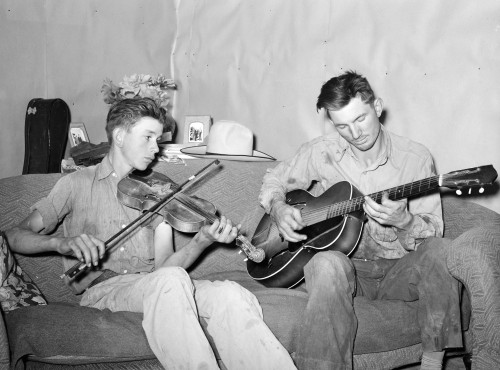 Musicians, 1940. /Na Farmer And His Brother Playing Music At Home In Pie Town, New Mexico. Photograph By Russell Lee, 1940. Poster Print by Granger Collection - Item # VARGRC0351998